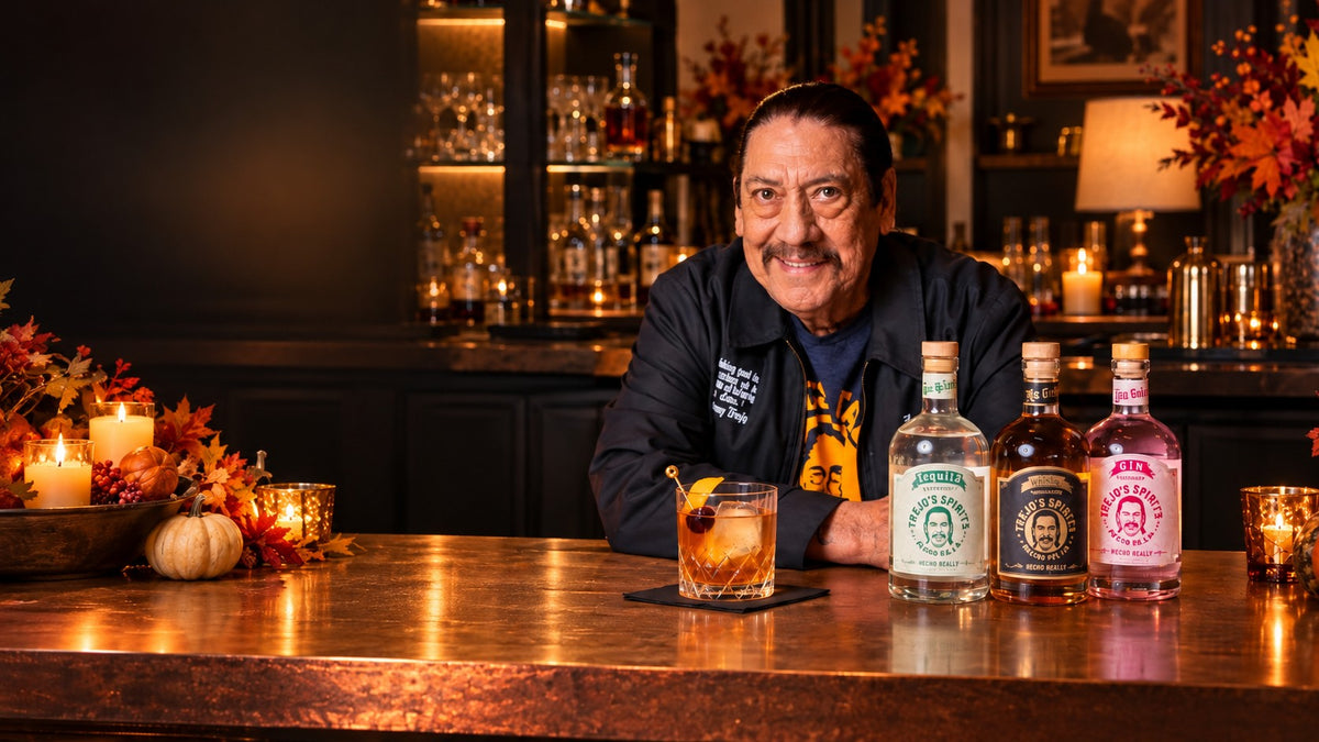 Danny Trejo at a dark bar with Trejo's zero proof spirits